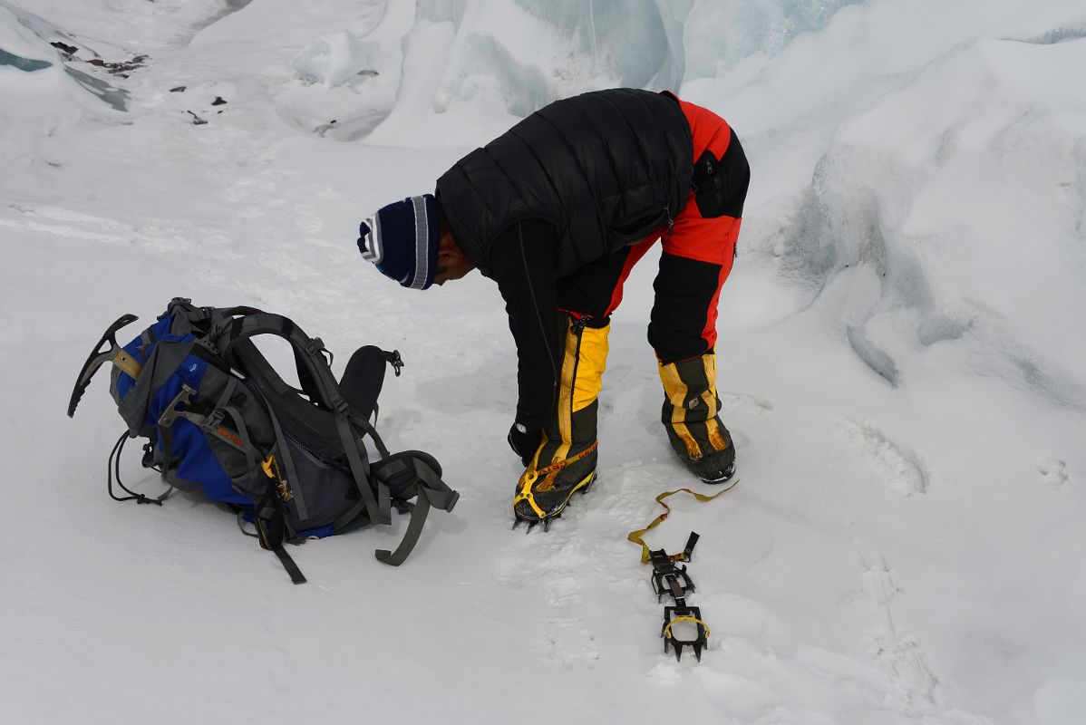 02 Climbing Sherpa Lal Singh Tamang Puts On Crampons As We Prepare To Go Through The Broken Up East Rongbuk Glacier On The Way To Lhakpa Ri Camp I 